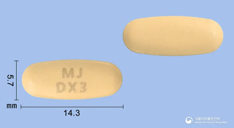 듀얼엑스정10/160mg 앞뒤 사진 (주황색 타원형, 각인 MJDX3)