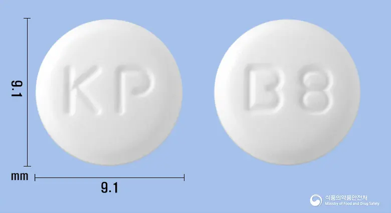 파마블로난세린정8밀리그램 앞뒤 사진 (흰색 원형, 각인 KP / B8)