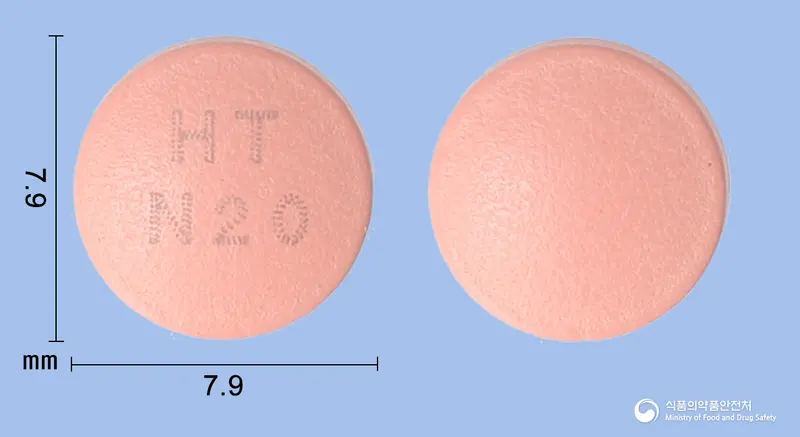 넥시메졸정20mg(에스오메프라졸마그네슘삼수화물) 앞뒤 사진 (분홍색 원형, 각인 HTN20)