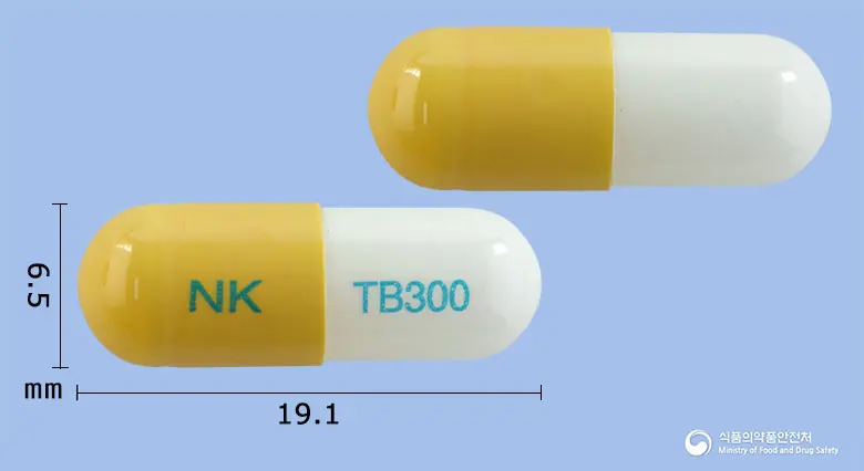 넥스코프캡슐(테오브로민) 앞뒤 사진 (노란색 캡슐, 각인 NK TB300)