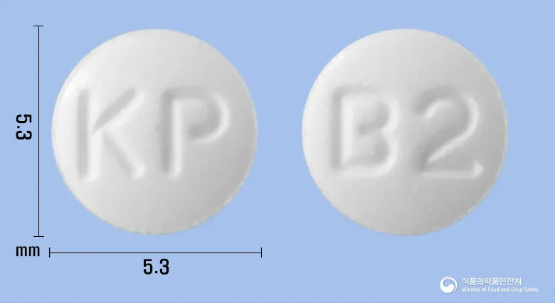 파마블로난세린정2밀리그램 앞뒤 사진 (흰색 원형, 각인 KP / B2)