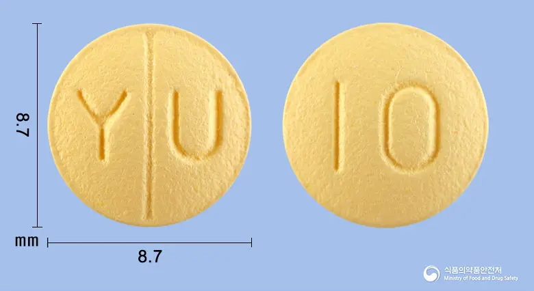 도네민정10밀리그램(도네페질염산염수화물) 앞뒤 사진 (노란색 원형, 각인 Y U / I0)