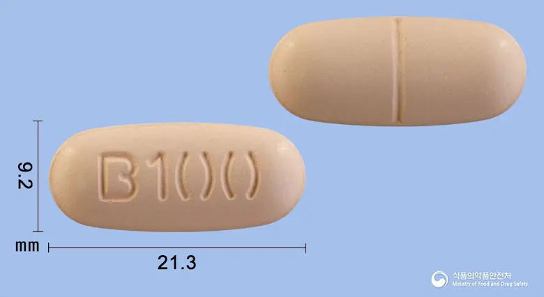 쎈비백정 앞뒤 사진 (분홍색 타원형, 각인 B100)