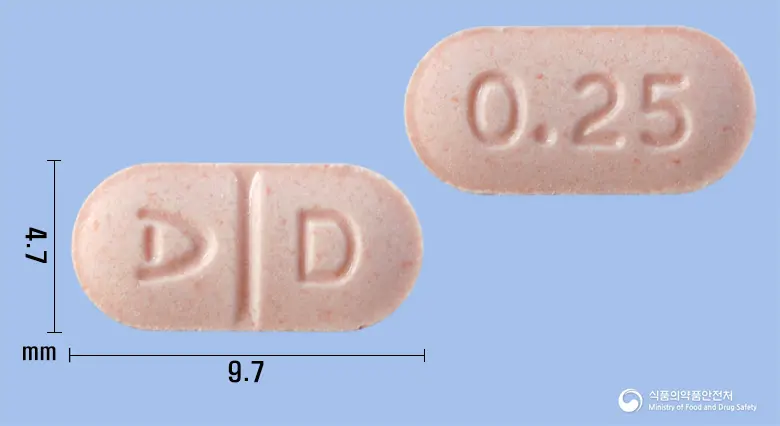 도스티넨정0.25밀리그램(카베르골린) 앞뒤 사진 (분홍색 장방형, 각인 D / 0.25)