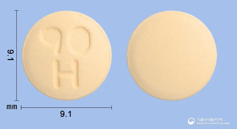 휴로린타정90mg(티카그렐러) 앞뒤 사진 (주황색 원형, 각인 90H)