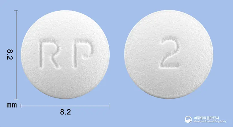 알피바스타틴정20mg(아토르바스타틴칼슘삼수화물) 앞뒤 사진 (흰색 원형, 각인 RP / 2)