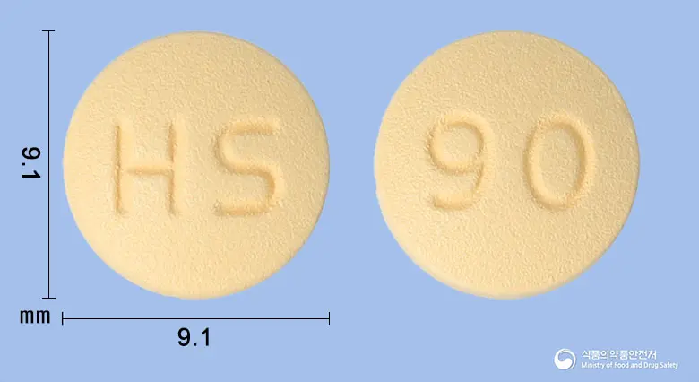휴티카정90밀리그램(티카그렐러) 앞뒤 사진 (주황색 원형, 각인 HS / 90)