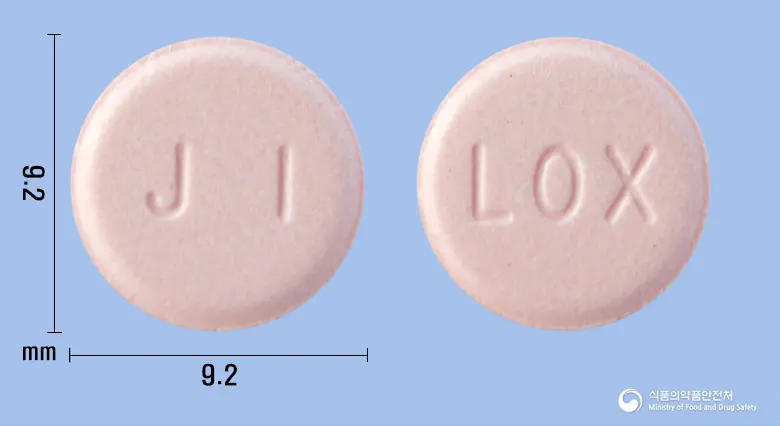 젠스펜정(록소프로펜나트륨수화물) 앞뒤 사진 (분홍색 원형, 각인 JI / LOX)