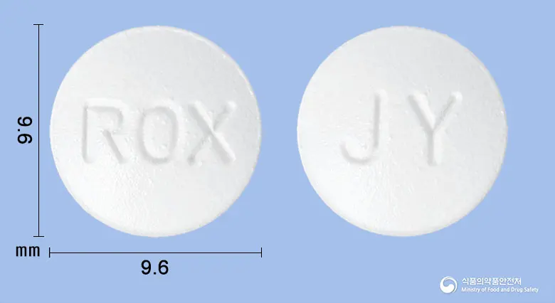 록시트로정(록시트로마이신) 앞뒤 사진 (흰색 원형, 각인 ROX / JY)