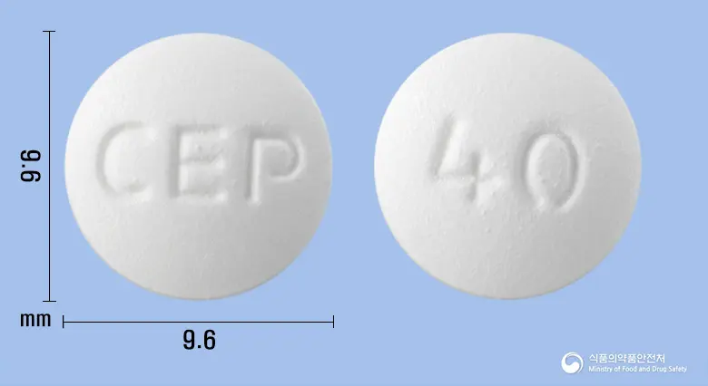 셀록신정(록시트로마이신) 앞뒤 사진 (흰색 원형, 각인 CEP / 40)