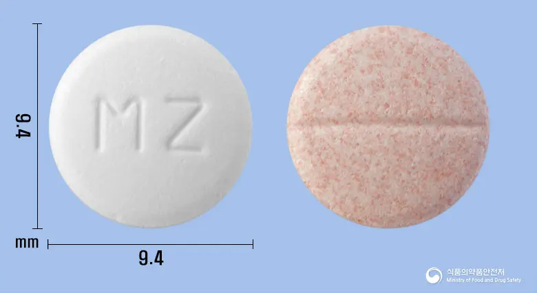몬테리진츄정 앞뒤 사진 (흰색 원형, 각인 MZ)