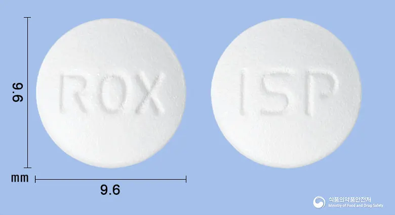 록시멘틴정(록시트로마이신) 앞뒤 사진 (흰색 원형, 각인 ROX / ISP)