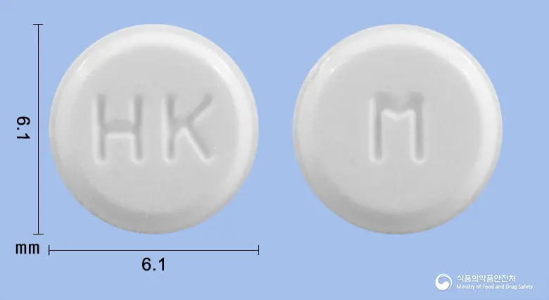 메디솔정(메틸프레드니솔론) 앞뒤 사진 (흰색 원형, 각인 HK / M)