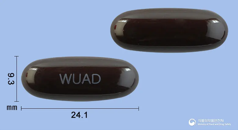 엑티본연질캡슐 앞뒤 사진 (갈색 캡슐, 각인 WUAD)