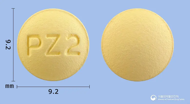 유니페질정10mg(도네페질염산염수화물) 앞뒤 사진 (노란색 원형, 각인 PZ2)