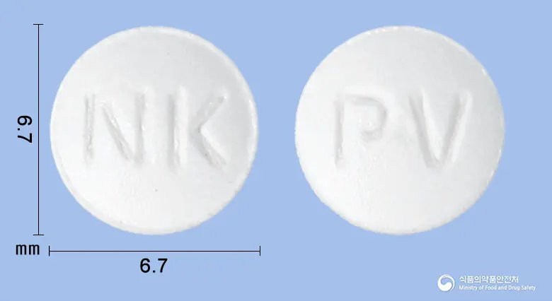 넥스베린정20mg(프로피베린염산염) 앞뒤 사진 (흰색 원형, 각인 NK / PV)