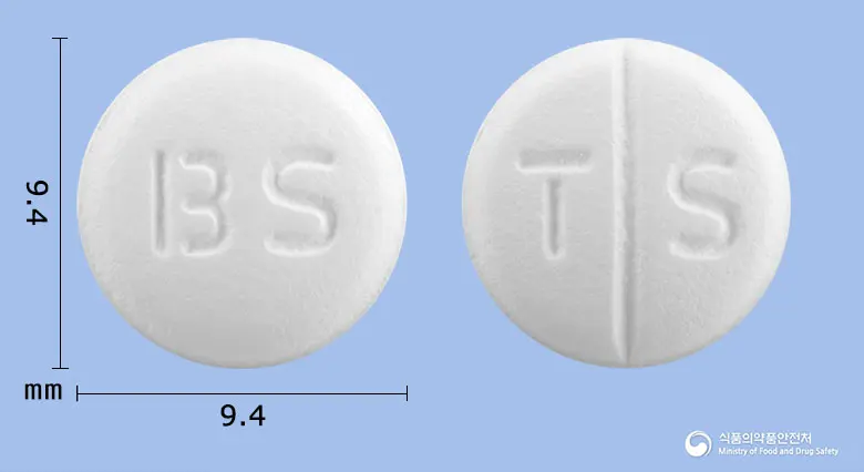 타리에스서방정(베포타스틴살리실산염) 앞뒤 사진 (흰색 원형, 각인 BS / T S)