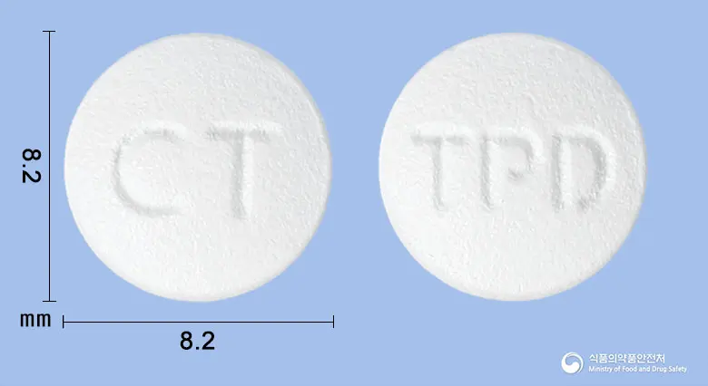 티로파민정(티로프라미드염산염) 앞뒤 사진 (흰색 원형, 각인 CT / TPD)