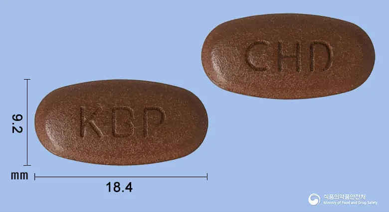 메가콘600정 앞뒤 사진 (갈색 타원형, 각인 KBP / CHD)