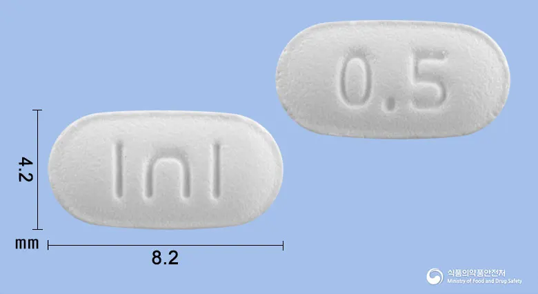 제로코틴정0.5mg(바레니클린살리실산염) 앞뒤 사진 (흰색 장방형, 각인 I∩I / 0.5)