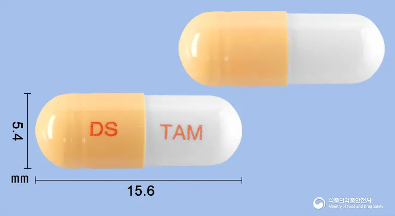동성탐스로신캡슐(탐스로신염산염) 앞뒤 사진 (주황색 캡슐, 각인 DS TAM)