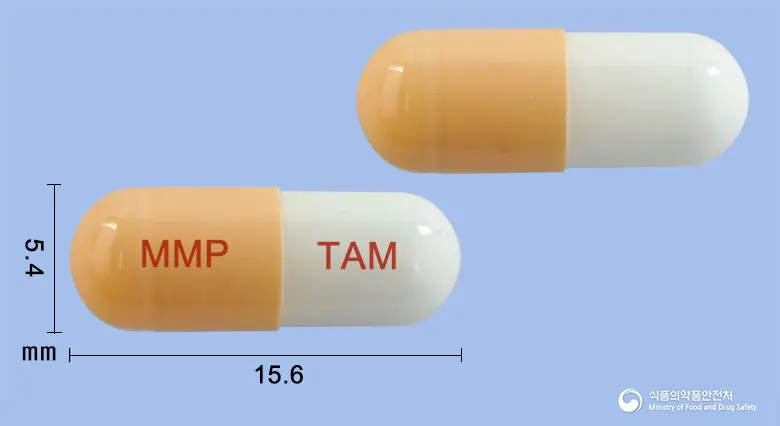 탐소날캡슐(탐스로신염산염) 앞뒤 사진 (주황색 캡슐, 각인 MMP TAM)