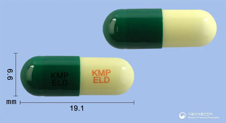 엘도스온캡슐(에르도스테인) 앞뒤 사진 (초록색 캡슐, 각인 KMP KMPELD ELD)
