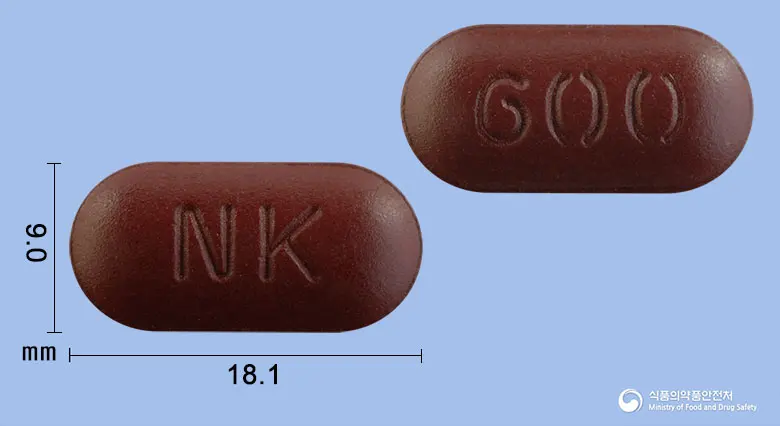 넥콘600에프정 앞뒤 사진 (갈색 장방형, 각인 NK / 600)