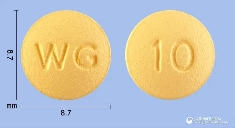 도네시지정10밀리그램(도네페질염산염일수화물) 앞뒤 사진 (노란색 원형, 각인 WG / 10)