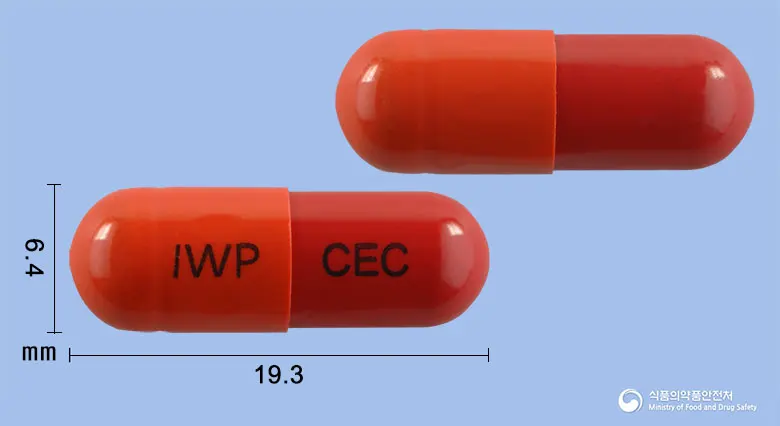 세파콜에프캡슐 앞뒤 사진 (주황색 캡슐, 각인 IWP CEC)