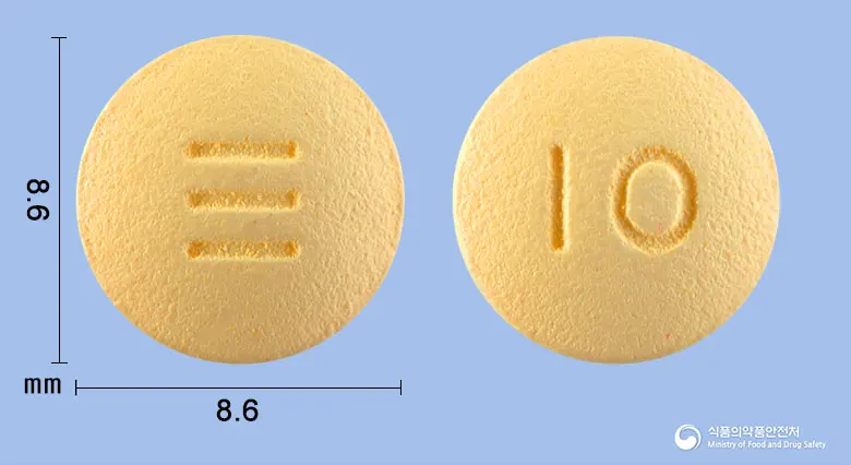 도페린정10밀리그램(도네페질염산염수화물) 앞뒤 사진 (노란색 원형, 각인 10)