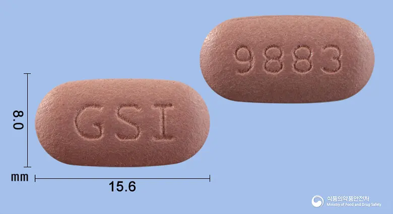 빅타비정 앞뒤 사진 (갈색 타원형, 각인 GSI / 9883)