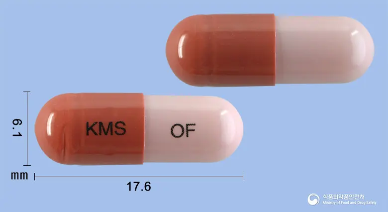 오피라졸캡슐(오메프라졸) 앞뒤 사진 (갈색 캡슐, 각인 KMS OF)