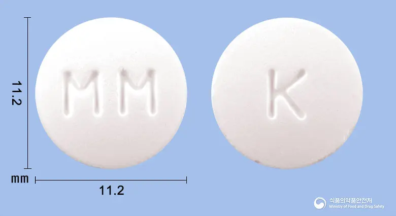 키미테정 앞뒤 사진 (흰색 원형, 각인 MM / K)