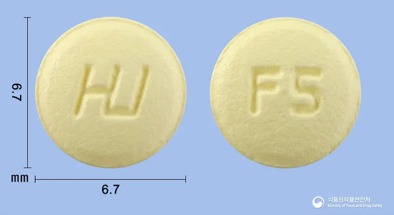 솔나신정5mg(솔리페나신숙신산염) 앞뒤 사진 (노란색 원형, 각인 F5)