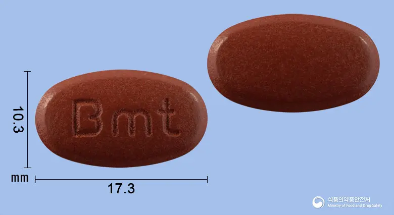 비맥스메타정 앞뒤 사진 (갈색 타원형, 각인 Bmt)