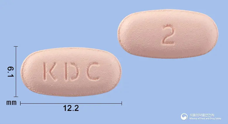로피맥스피디정2밀리그램(로피니롤염산염) 앞뒤 사진 (분홍색 타원형, 각인 KDC / 2)