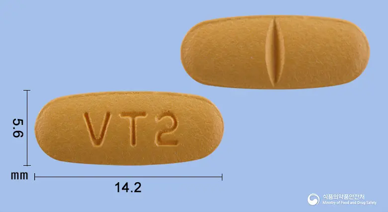 디오잘탄정160mg(발사르탄) 앞뒤 사진 (주황색 타원형, 각인 VT2)