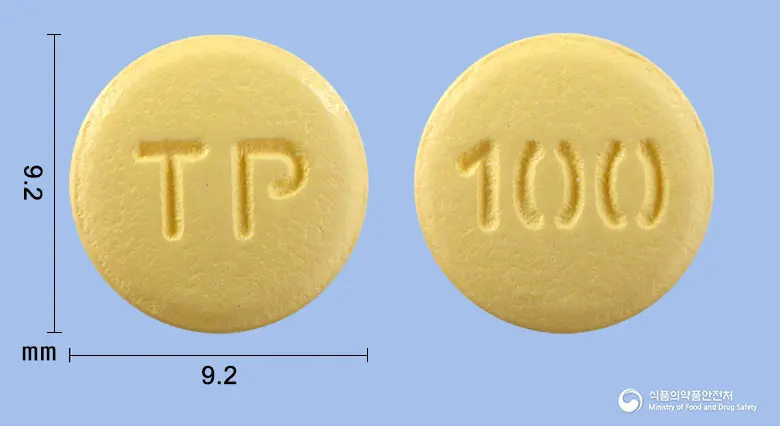 토피맥스정100mg(토피라메이트) 앞뒤 사진 (노란색 원형, 각인 TP / 100)