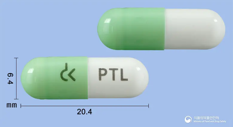 피타론에프캡슐 앞뒤 사진 (연두색 캡슐, 각인 PTL)