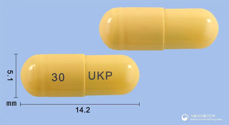 유니타미비르캡슐30mg(오셀타미비르인산염) 앞뒤 사진 (노란색 캡슐, 각인 30 UKP)