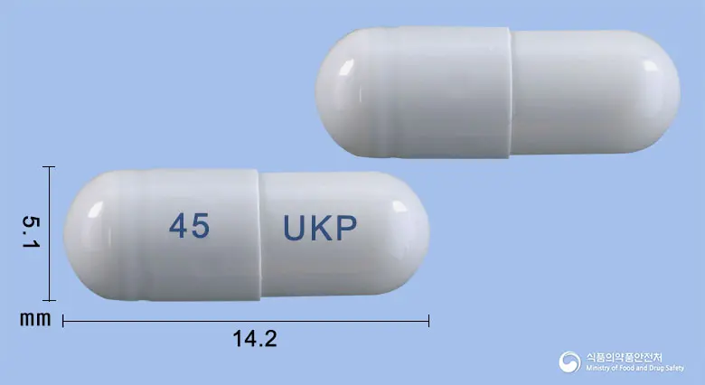 유니타미비르캡슐45mg(오셀타미비르인산염) 앞뒤 사진 (회색 캡슐, 각인 45 UKP)