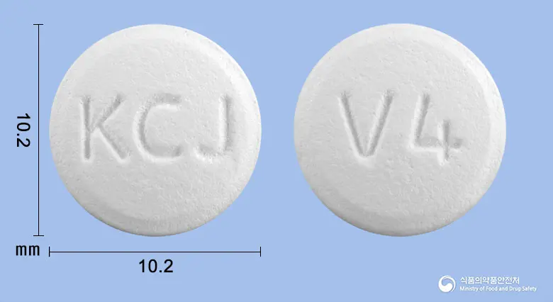 제이팜시정250mg(팜시클로비르) 앞뒤 사진 (흰색 원형, 각인 KCJ / V4)