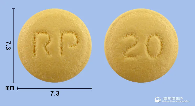알피라베정20mg(라베프라졸나트륨) 앞뒤 사진 (노란색 원형, 각인 RP / 20)