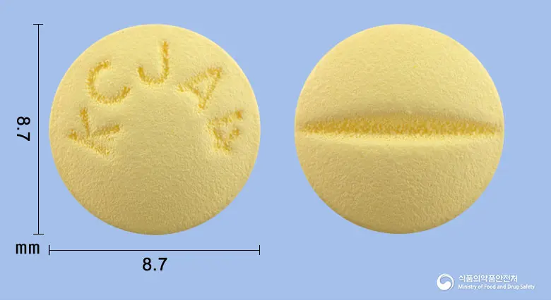 제이페질정10mg(도네페질염산염수화물) 앞뒤 사진 (노란색 원형, 각인 KCJ A4)