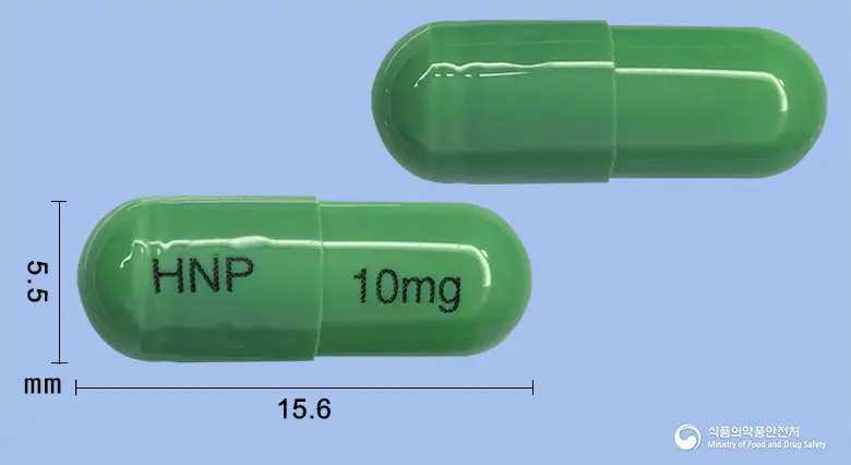 디프세틴캡슐10밀리그램(플루옥세틴염산염) 앞뒤 사진 (연두색 캡슐, 각인 HNP 10mg)