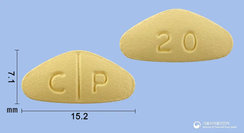제대로필정20mg(타다라필) 앞뒤 사진 (노란색 삼각형, 각인 C P / 20)