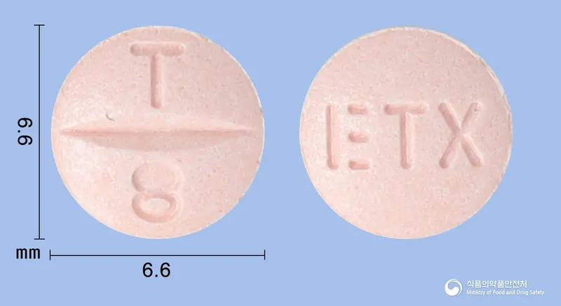 칸데큐어정8밀리그램(칸데사르탄실렉세틸) 앞뒤 사진 (분홍색 원형, 각인 T 8 / ETX)
