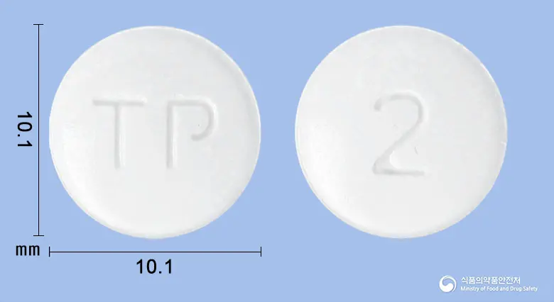 텔로살탄플러스정80/12.5mg 앞뒤 사진 (흰색 원형, 각인 TP / 2)
