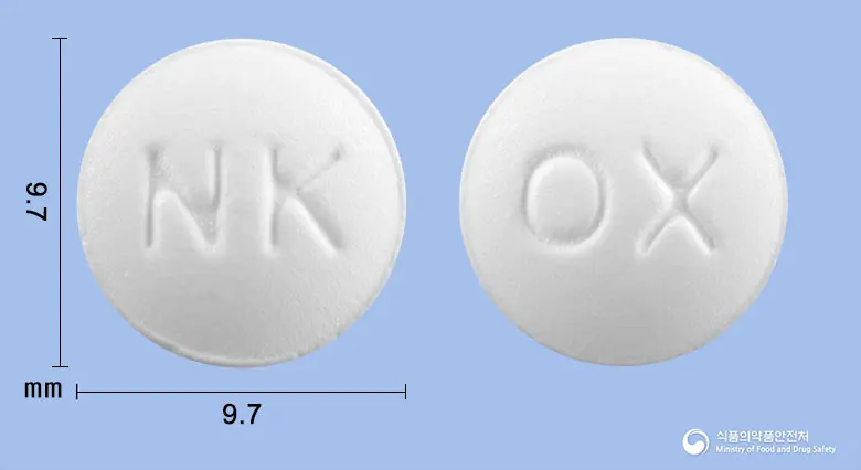 트로신정(록시트로마이신) 앞뒤 사진 (흰색 원형, 각인 NK / OX)